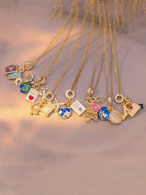 Golden Eiffel Tower & Travel Charm Necklace